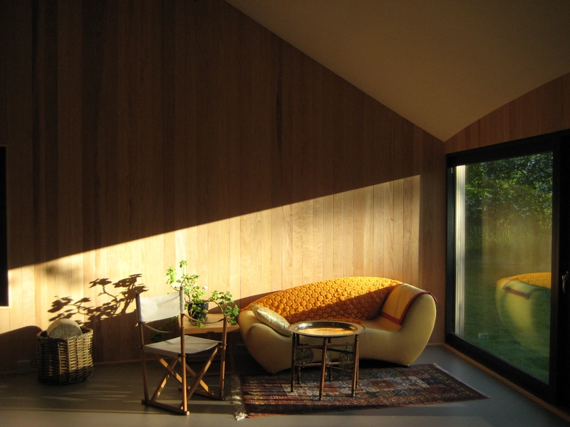 Vindhuset Vindhuset. Stue i aftenlys