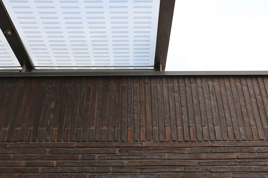 Underjordisk Parkeringshus Nørre Allé Detalje tegl møder glastag