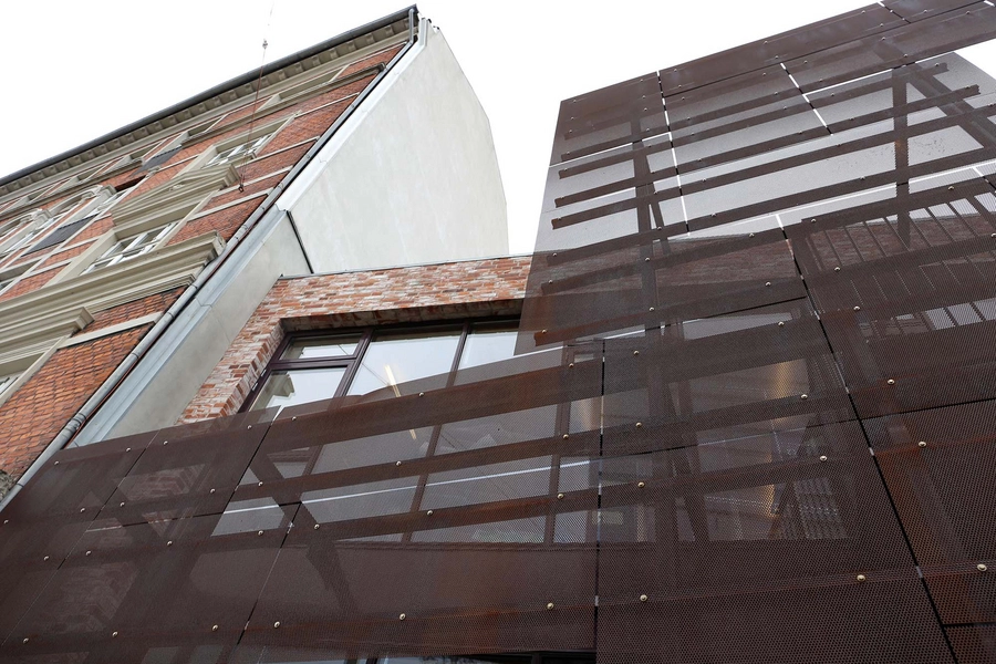 Bording Friskole Karré, genbrugt tegl, perforeret cortenstål