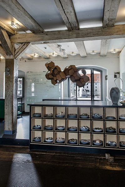 Noma & Noma Food Lab Noma FoodLab, reoler af CNC fræsede elementer