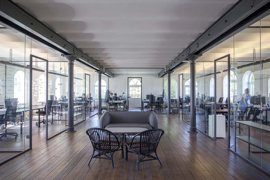 Beklædningsmagasinet - Rainmaking Loft Kontorer i bygningens sydlige ende