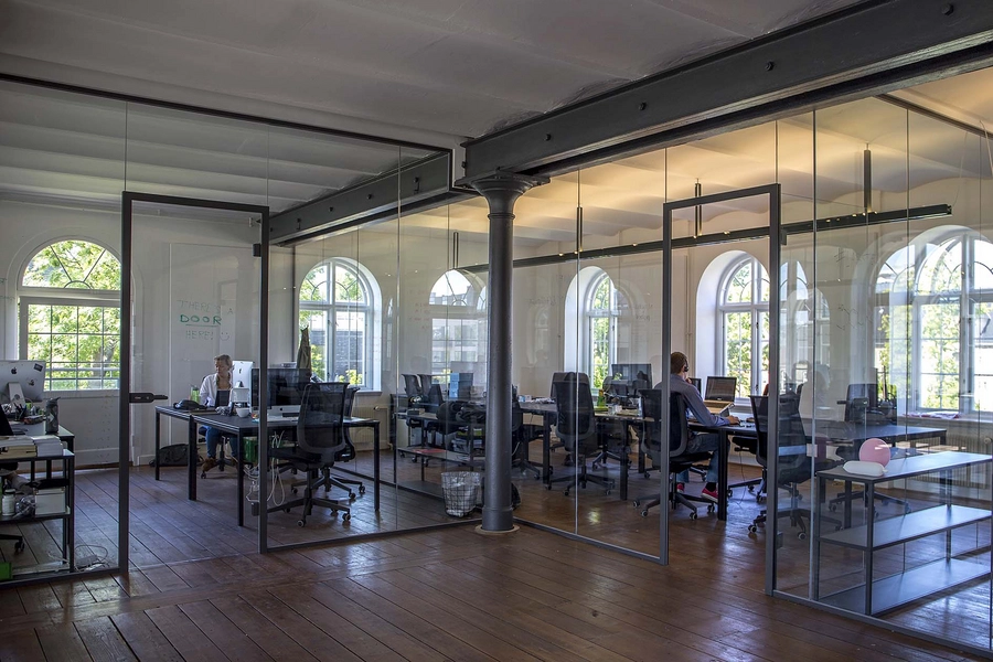 Beklædningsmagasinet - Rainmaking Loft Kontorer i bygningens sydlige ende