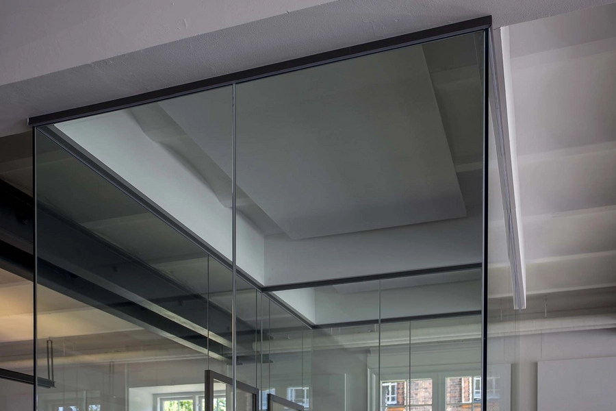 Beklædningsmagasinet - Rainmaking Loft Detalje, glasboks