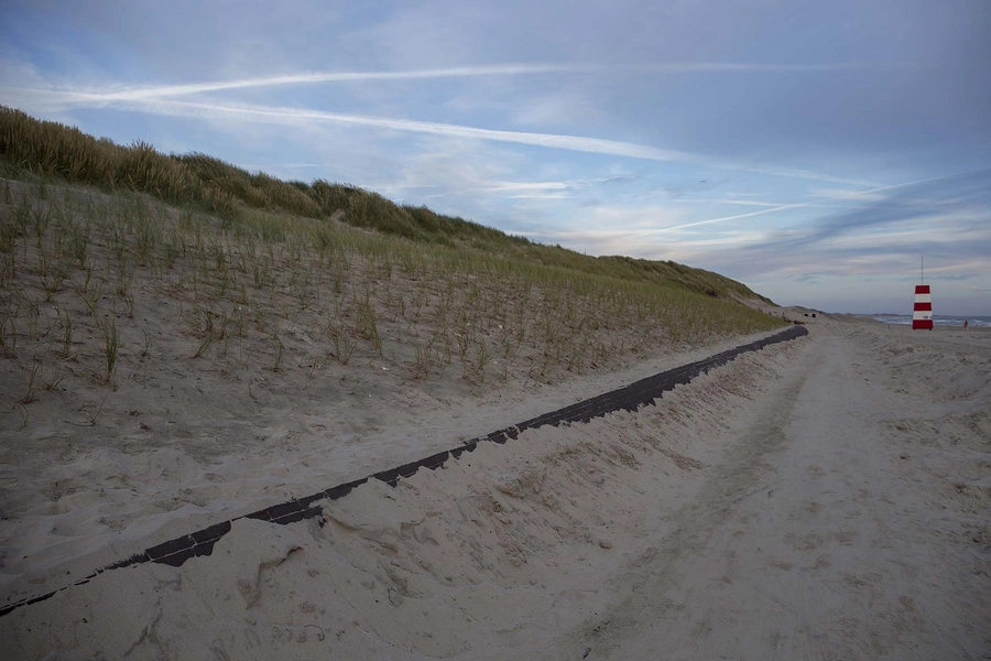 Vestled Bronzeskulpturen i sandet