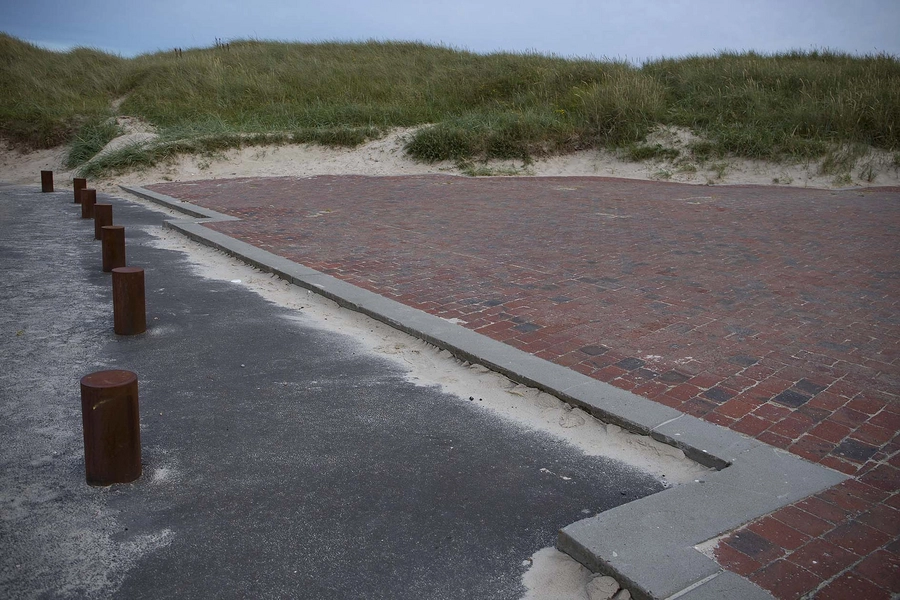 Vestled Overgang fra parkeringsplads til teglflade