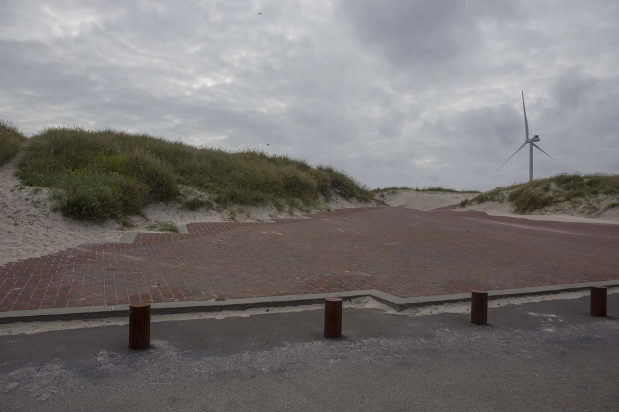 Vestled Overgang fra parkeringsplads til teglflade