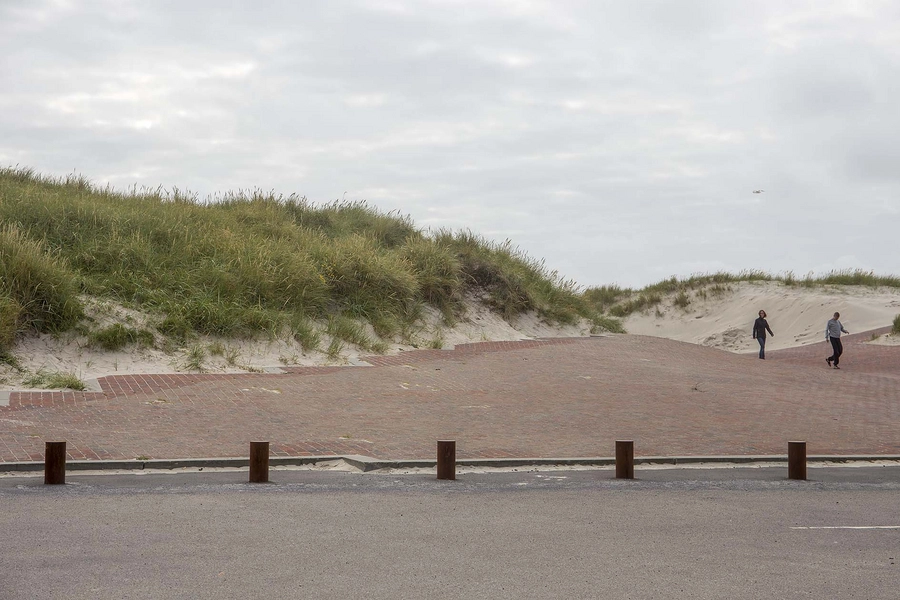 Vestled Overgang fra parkeringsplads til teglflade