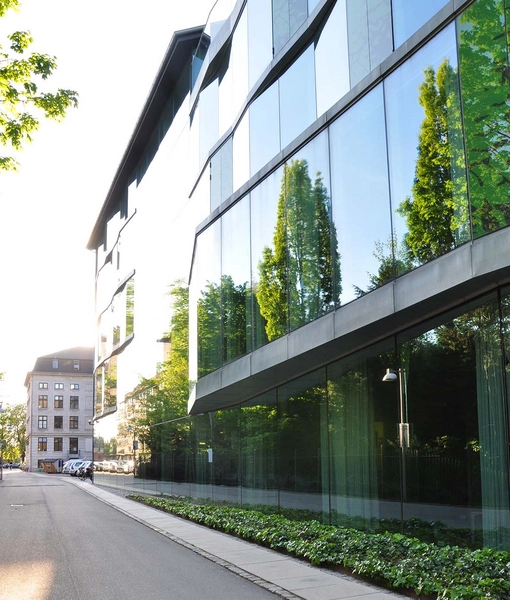 CBS Porcelænshaven Den grønne facade spejler træerne i Frederiksberg Have